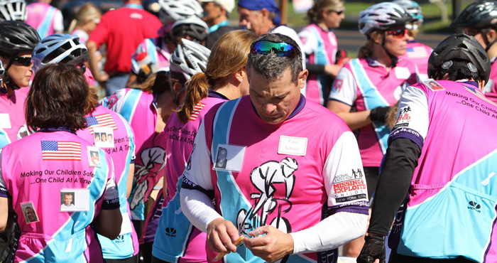 riders wearing a missing child pin